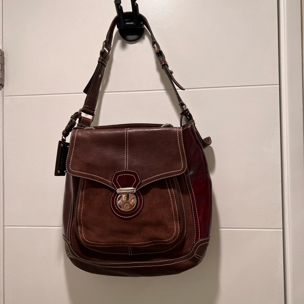 Dolce & Gabbana “Miss Catch” brown handbag.